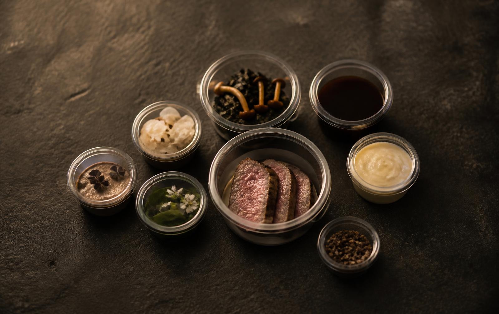 Components of a dish packed separately in sealed containers